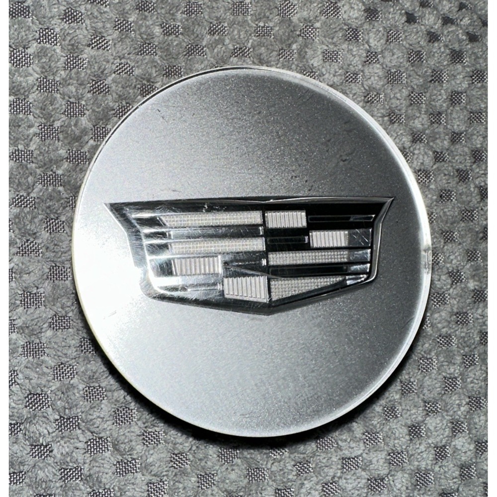 Cadillac OEM Silver Center Cap. #9597375. 2-5/8" Diameter.